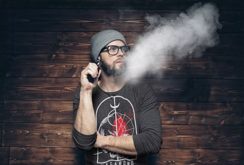 man wearing Vagabond shirt vaping