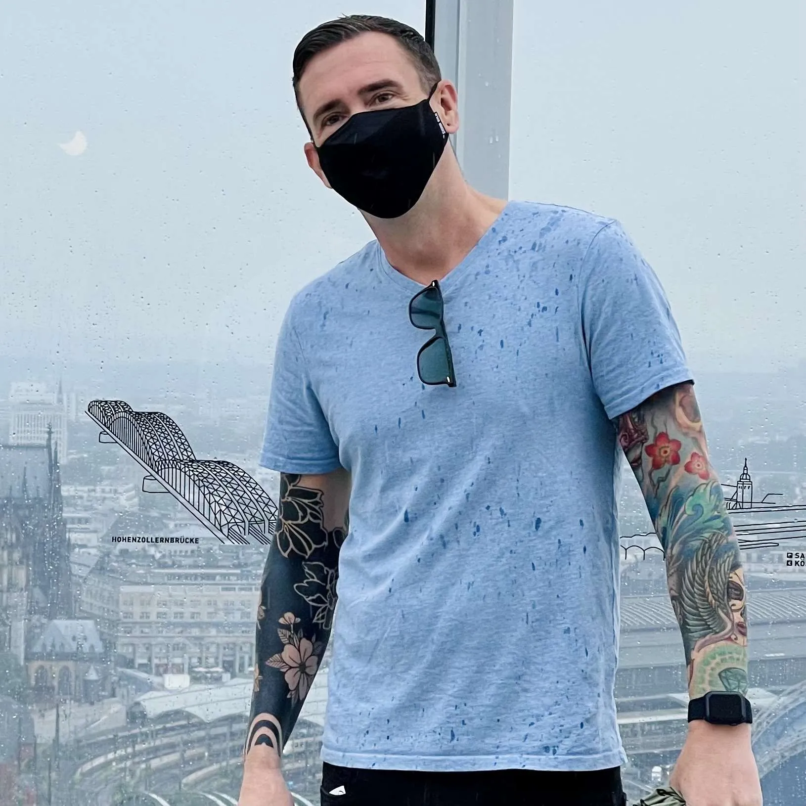 Kieran showing his tattoo sleeves